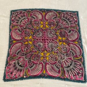 Hermès 100CM wool/silk fringed scarf with Batik inspired design.